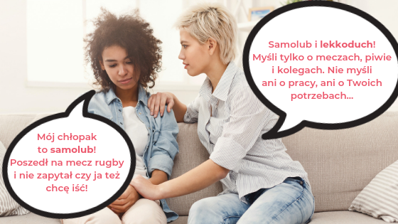 Two women sitting on a couch and talking.